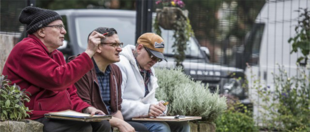 Two people sitting happy